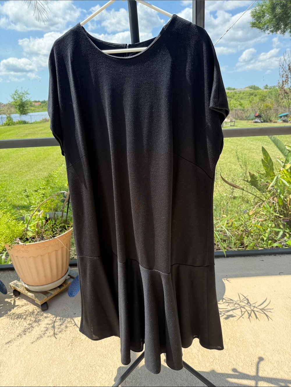 Relaxed Black short sleeved Midi Dress with Flounced Hem